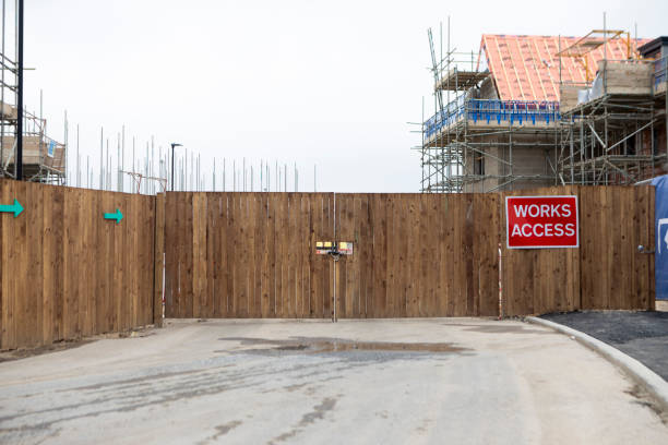 istock Entrance gate to a new housing development site 2155395144