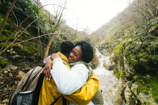 istock Young couple hiking the beautiful nature 2155399681