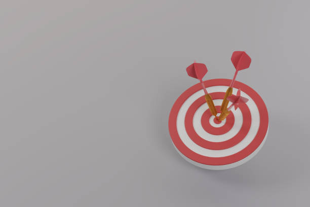 istock Red dart hit on center of target, surrounded by empty white dart board, 2155401636