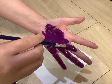 Purple Splashed Handprint Make A Handprint With Purple Paint Stock Photo - Download Image Now ...