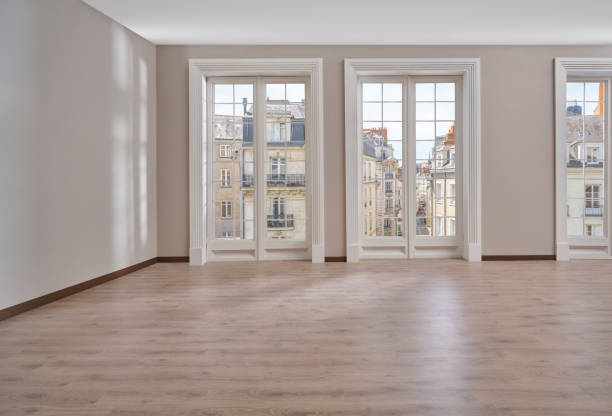 istock Empty room, wall, window, parquet style, interior concept, area for furniture sofa table carpet decoration. 2155411014