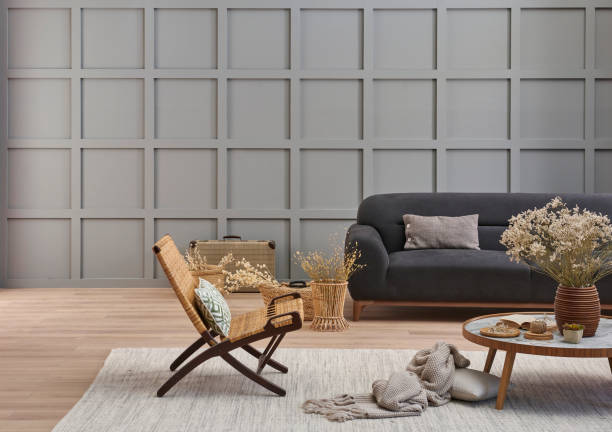 istock Grey room decorative wall background, dark blue sofa, middle table, blanket pillow style, vase of cotton flower and carpet, orange lamp, interior decoration. 2155411169