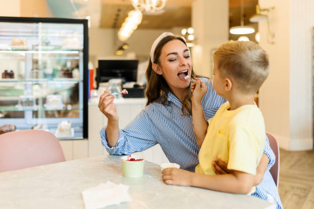 istock Mother and Son Enjoying Ice Cream 2155414161