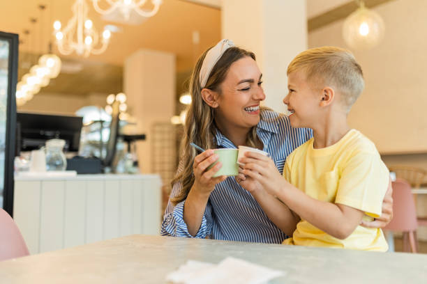 istock Mom and Son Sharing a Treat 2155414162
