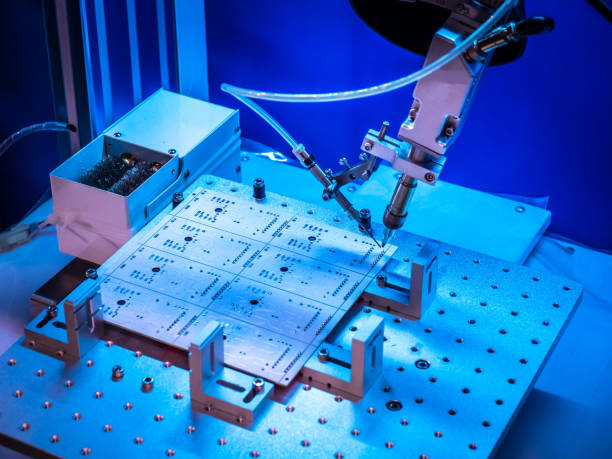 istock soldering iron tips of robotic system for automatic point soldering for printed and assembly electric circuit board ( PCB ) at factory. Automation of production. Soldering iron. 2155416277