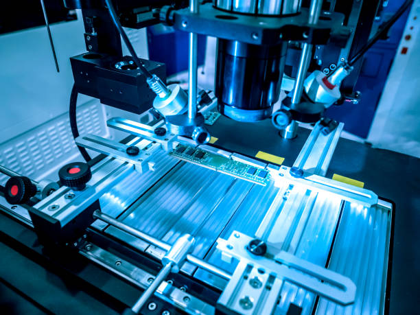 istock Automation of production. Soldering iron. Electric circuits. Microchips. Soldering iron tips of automated manufacturing soldering and assembly pcb board 2155416314