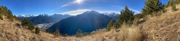 istock Mountain landscape nature sunny blue trees wild blue sky 2155421289