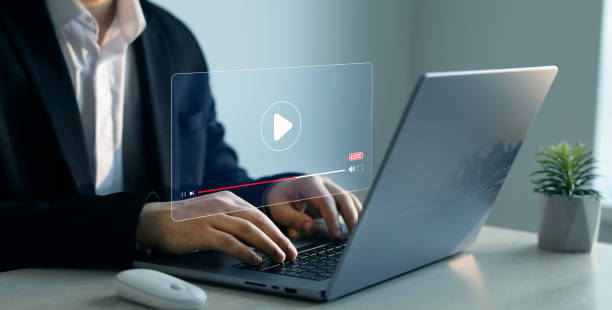 istock Businessman watching online live conference.Live digital multimedia player.Digital online live stream window. Video streaming on internet media. 2155423557