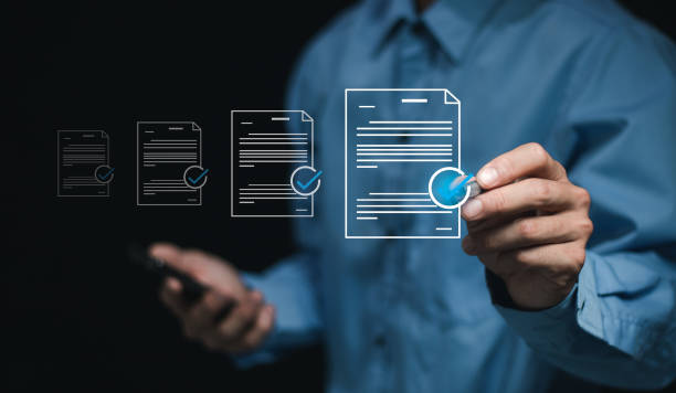 istock Digital checklist documents and Online business assessments, Businessman checking electronic documents and approval checklist. 2155428389