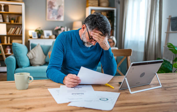 istock Mature man frustrated with financial problems 2155428539