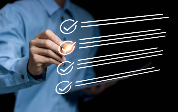 istock Smart checklist online on virtual screen and business management concept, Businessman pointing on the electronic checklist quality control and document review in the system of quality assurance 2155428609