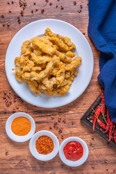 istock Chengdu Cuisine Crispy Pork on a Wooden Table 2155433340