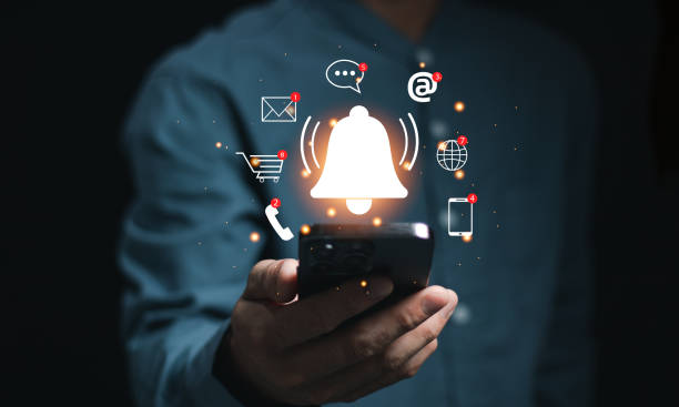 istock Business people using smartphone with virtual bell ringing for application notification alert concept, New email, digital marketing, electronic message alert. 2155433619