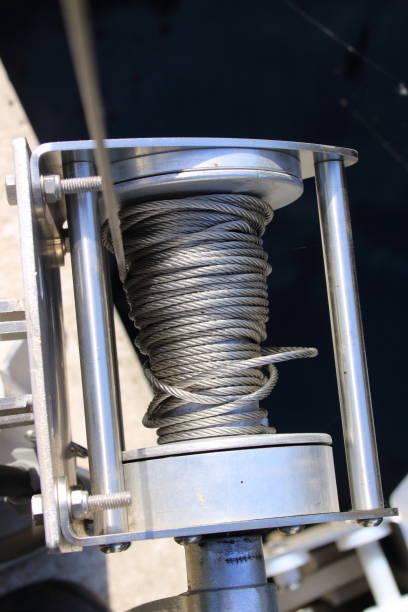 istock Wire rope from a winch is wound up in a mess 2155436537