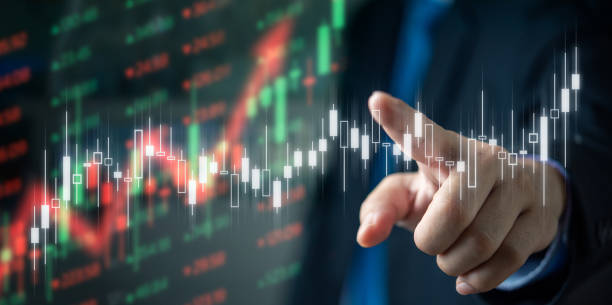 istock A man is pointing at a graph stock market 2155437483