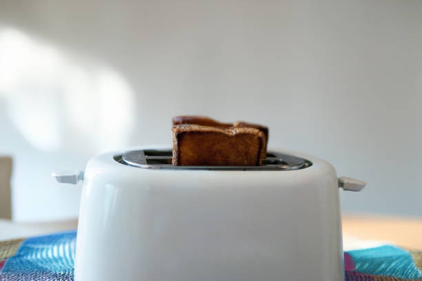istock toaster with toasted bread ready to eat 2155437555