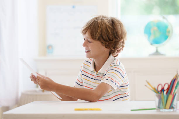Boy holding a card