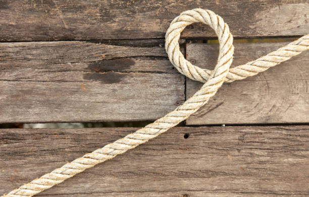 istock Rope on a wooden background 2155444538