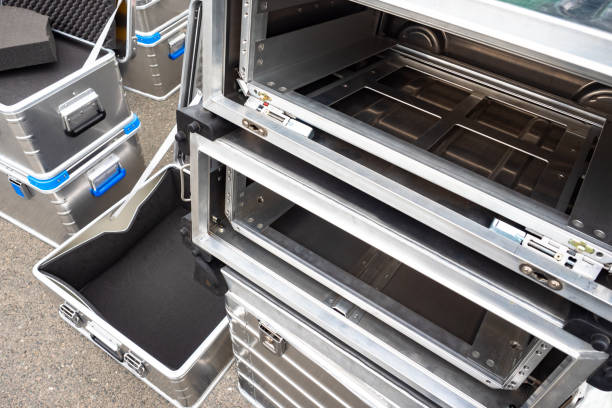 istock Metal boxes. Equipment storage boxes. Boxes for transporting professional furnishing. Shipping container. Transportation of musical equipment. Safe transportation of goods. Open metal containers 2155444796