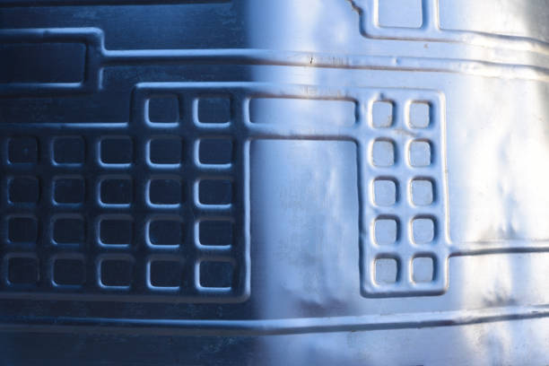Shiny metal surface. The shiny radiator of an old refrigerator.