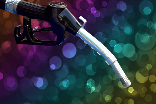 Automatic car fuel filling nozzle on a colorful bubble background