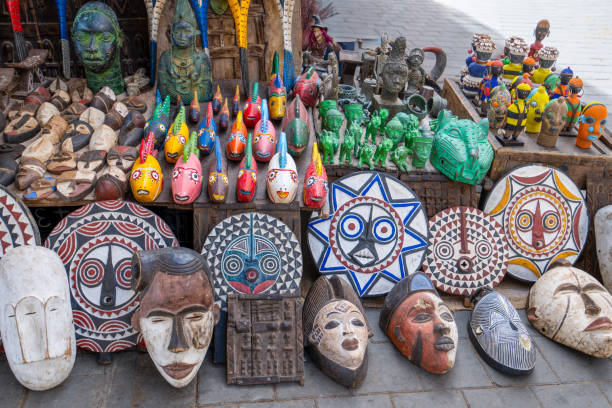 Essaouira, Morocco - March 17, 2024: Colorful ancient totem design clay figures for sale in local market.