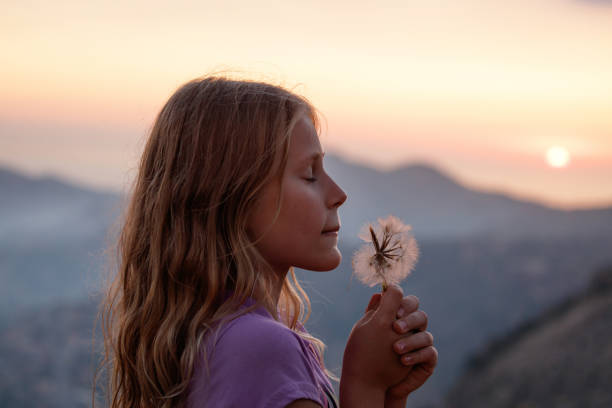 istock Dreamy Girl Making a Wish 2155465957