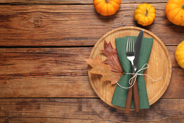 istock Stylish autumn table setting on wooden background, flat lay. Space for text 2155469342
