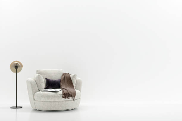 Selction of various armchairs and sofas in a furniture store.