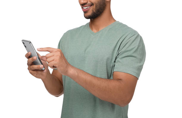istock Man sending message via smartphone on white background, closeup 2155475231