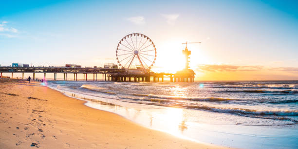 istock Beautiful coastline at Den Haag, Netherlands, at sunset 2155476160