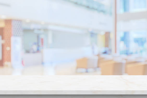 istock Marble table top with blur hospital clinic medical interior background 2155478431