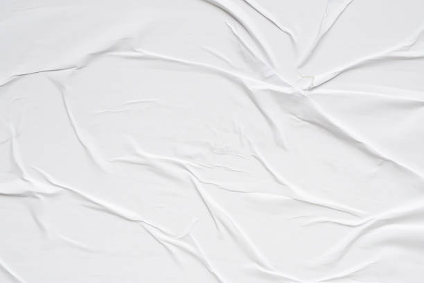 istock White blank crumpled and creased paper poster texture background 2155478476