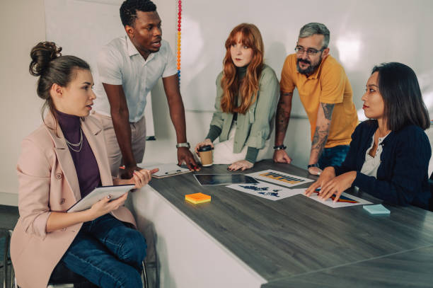 istock Happy multiracial business team working together at corporate briefing 2155479022