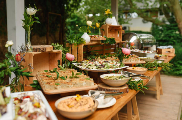 istock Buffet food for party decorated with fresh plants. 2155483757
