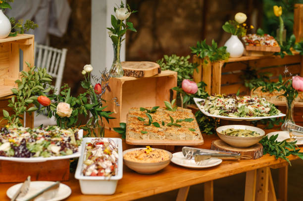 istock Buffet food for party decorated with fresh plants. 2155483770