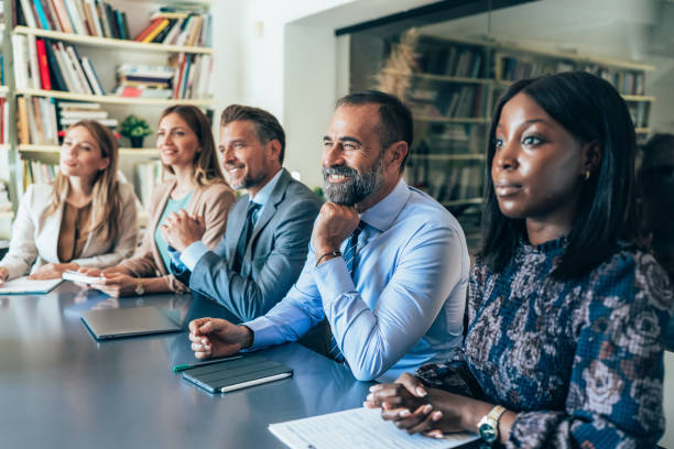 istock Multi-ethnic group of business persons during a conference 2155484332