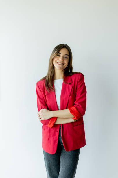istock Confident woman smiling in bright office space during daytime 2155484938