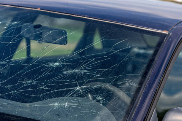 istock Broken windshield on a car. Damaged glass on a car. 2155485476
