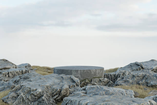 istock 3d render platform and Natural summer background, Stone podium on Grassland in the valley with rock and mountain for product stand display, advertising, mockup or etc 2155486117