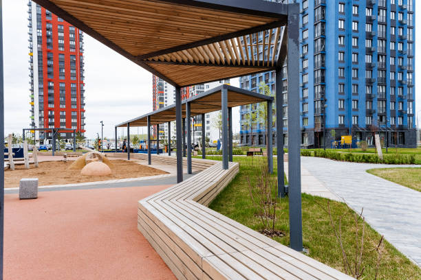 istock Urban design fixture bench under canopy in front of building 2155492860