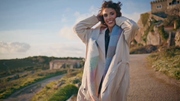 istock Cheerful traveler posing medieval castle view looking camera with smile closeup. 2155493162