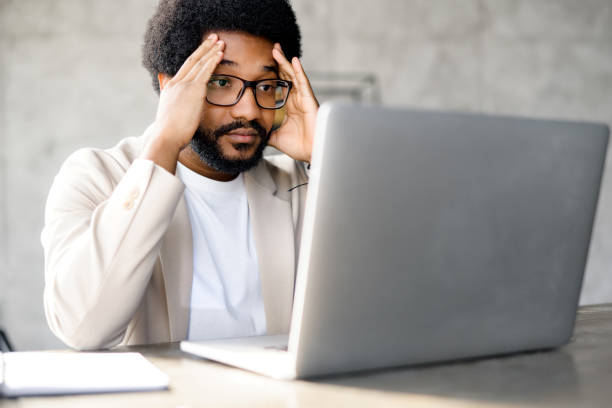 istock A young businessman appears troubled 2155493491