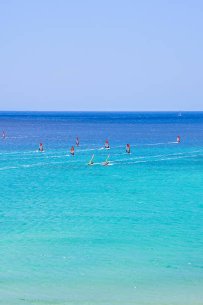 istock A group of people are surfing in the ocean 2155494936