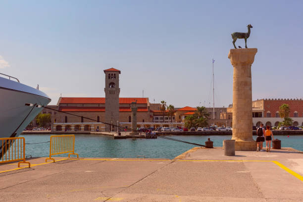 Rhodes, Greece,  Mandraki harbor with windmills.