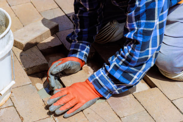 istock In reconstruction, brick path that has been destroyed is replaced with a new part that is broken 2155496133