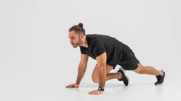 istock Man in black working out with lunge stance 2155498307
