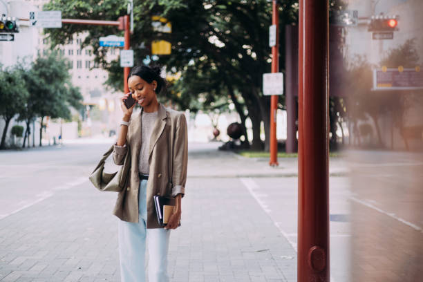 istock Businesswoman Talking on Phone Outdoors in City Setting 2155498748