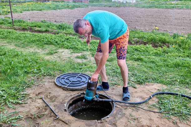 istock Water transfer from well for effluent disposal with high pressure drainage pump. 2155498786