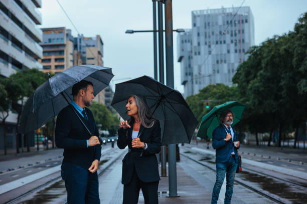 istock Businesspeople waiting for a train. 2155503161